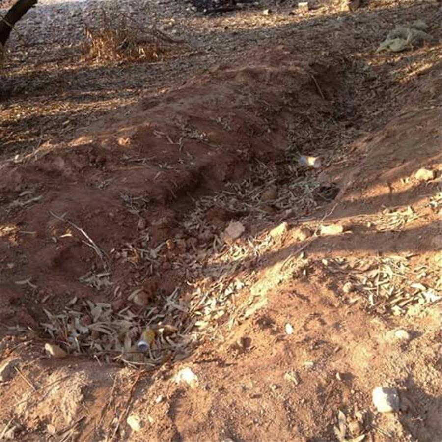 بالصور: العثور على مقبرة جماعية بغابة بو مسافر غرب درنة