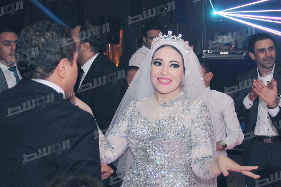 بالصور: هشام عباس وحكيم يشعلان حفل زفاف معتز وإيمان
