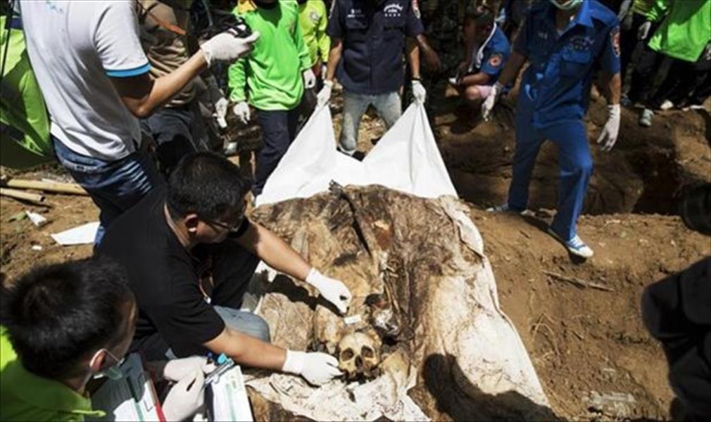 ماليزيا تعثر على 20 جثة في مقابر جماعية قرب تايلاند