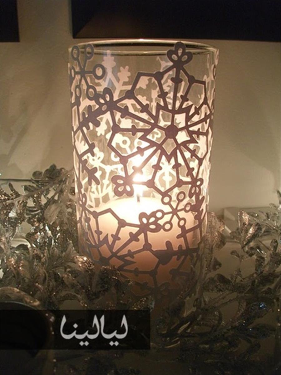 الشموع لإضفاء لمسة شاعرية على زينة رأس السنة