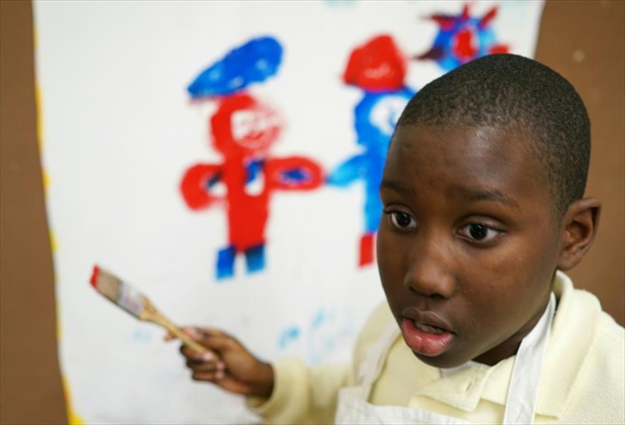 الأطفال السود يحتمون بالفن ضد الرصاص