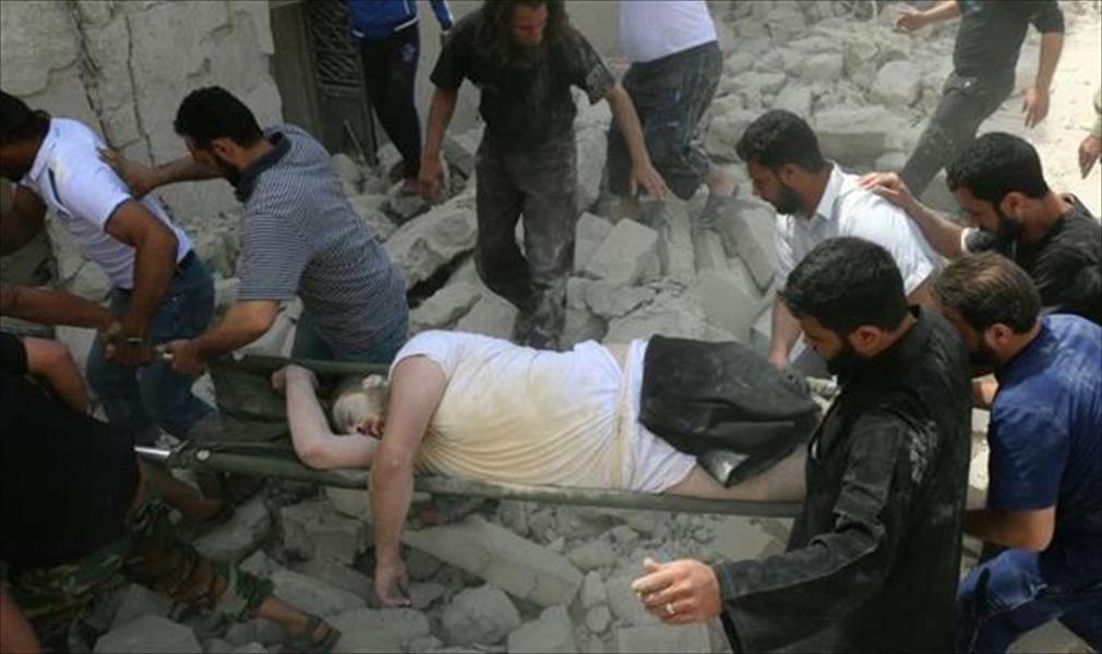 20 قتيلاً في قصف مجهول على مستشفى ومبنى سكني في سورية