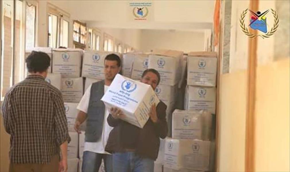 «الليبية للإغاثة» تواصل توزيع السلة الغذائية على نازحي بنغازي
