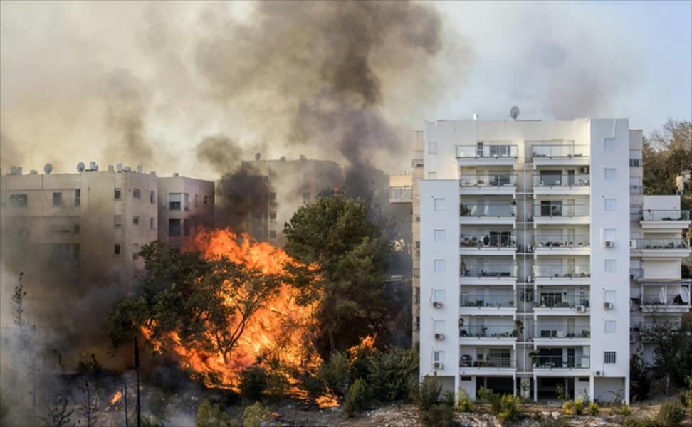 إجلاء 50 ألف شخص من حيفا.. وإسرائيل: الحرائق متعمدة