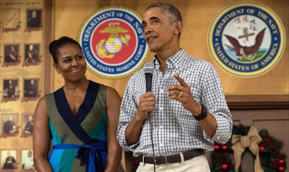 أوباما يقضي عطلة الميلاد مع زوجته في قاعدة عسكرية