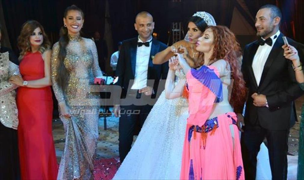 بالصور: زفاف التونسية ساندي على رجل أعمال مصري