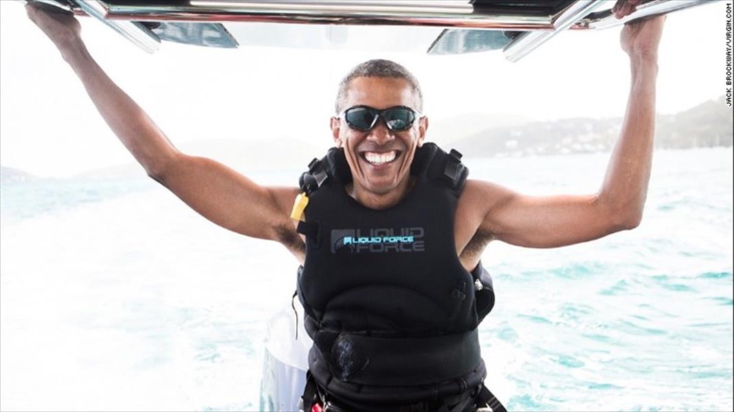 بالصور: أوباما يمضي عطلة على جزيرة يملكها ملياردير بريطاني