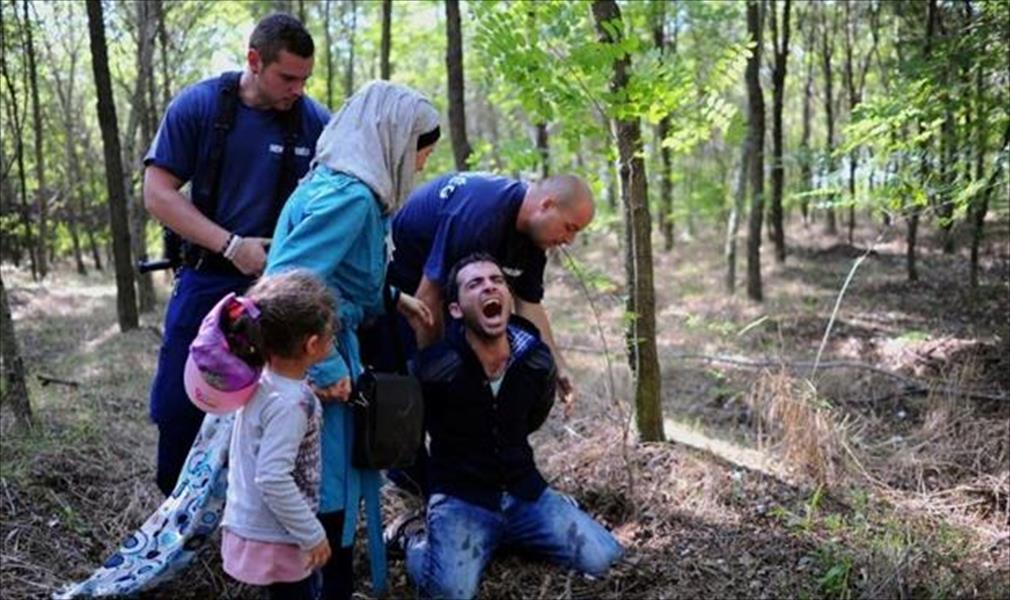 البرلمان المجري يعتمد قرارًا يجيز التوقيف التلقائي لكل المهاجرين في البلاد