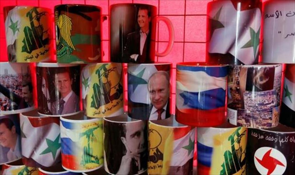 ترامب وماي يؤكدان وجود «فرصة» لإقناع روسيا بالتخلي عن الأسد