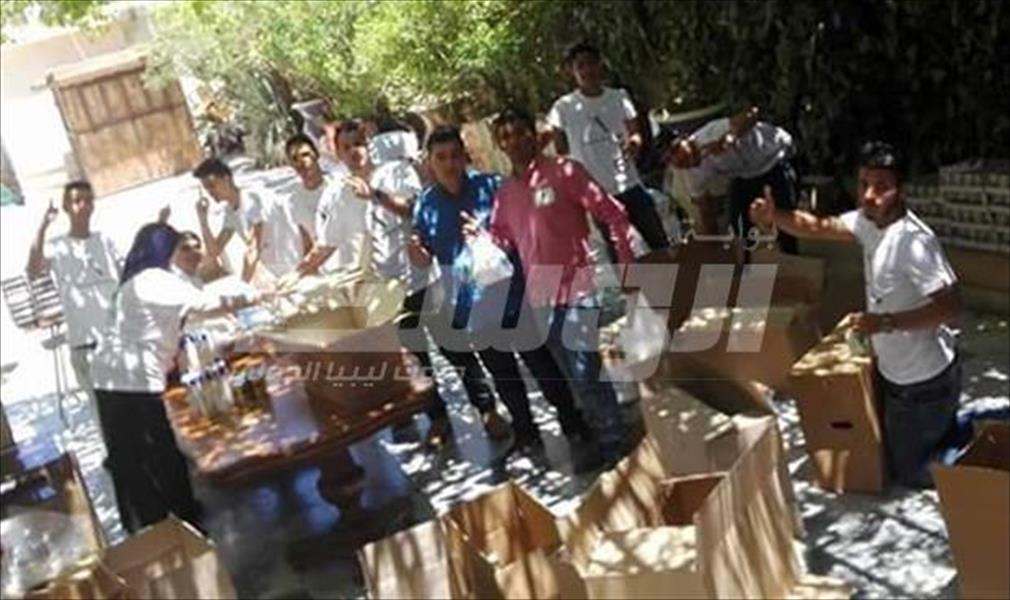 مؤسسات خيرية توّزع سلات غذائية على الأسر المحتاجة في بنغازي