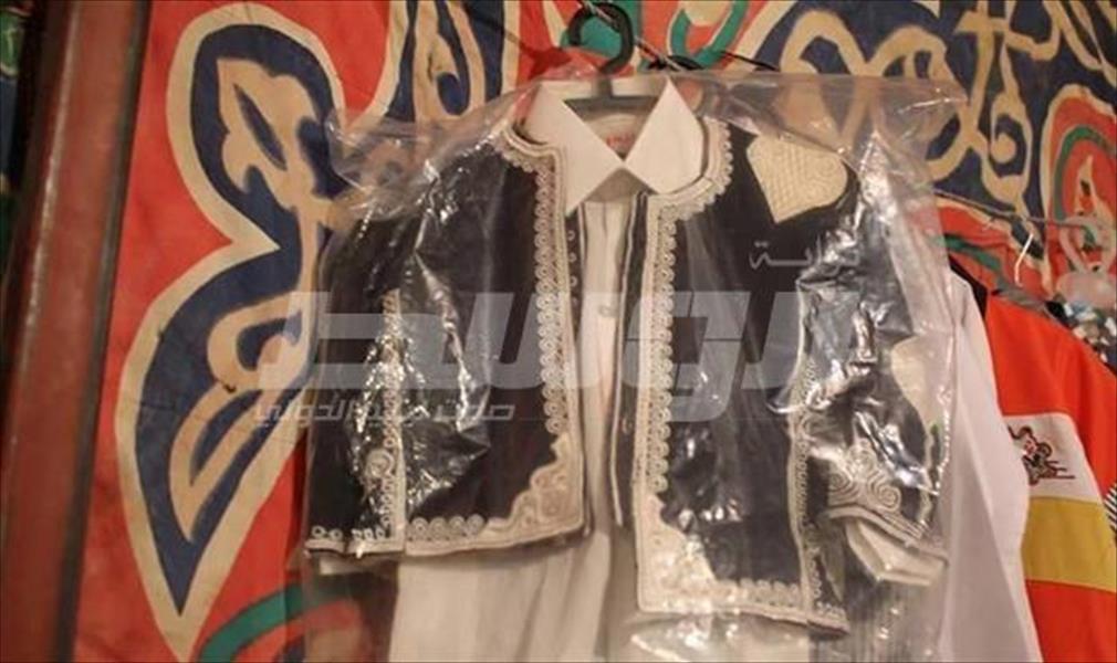 بالصور: افتتاح بزار خيري لملابس العيد في الكفرة
