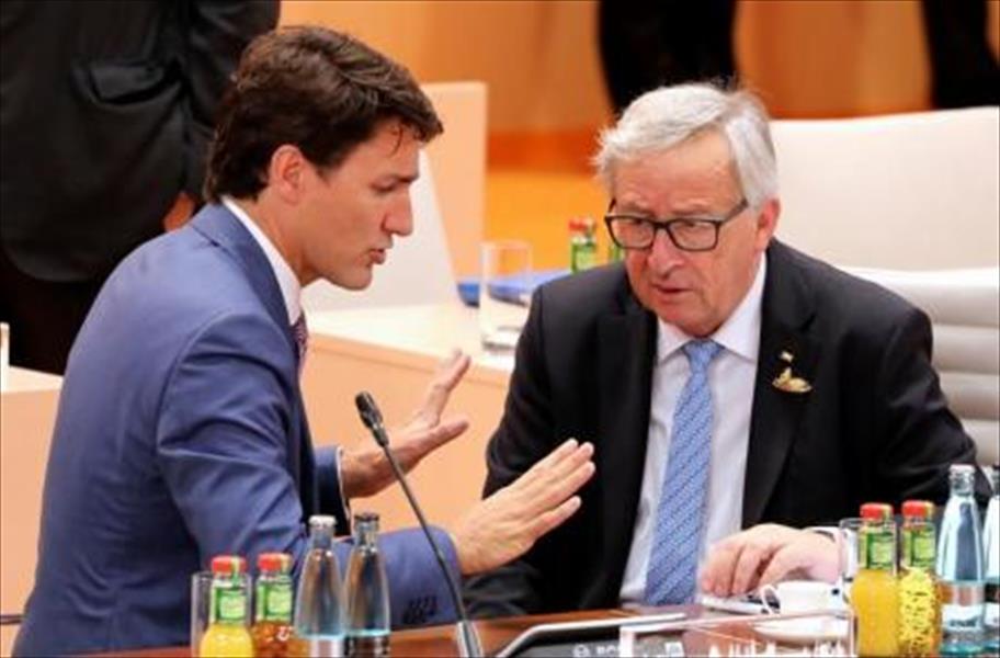أوروبا وكندا تتفقان على بدء تطبيق اتفاقية للتجارة الحرة