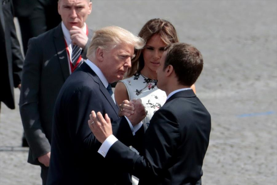 ترامب: ماكرون رئيس قوي لكنه يحب أن يمسك يدي!