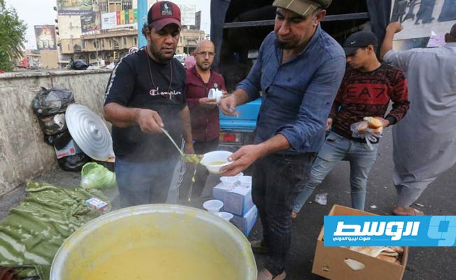 «فرانس برس»: مستشفيات ومطابخ وحراس في ساحة التحرير ببغداد