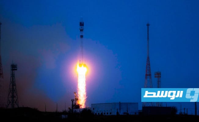 انطلاق صاروخ سويوز من قاعدة بايكونور في كازاخستان حاملا 38 قمرا اصطناعيا من 18 بلدا في 22 مارس 2021. (أ ف ب)