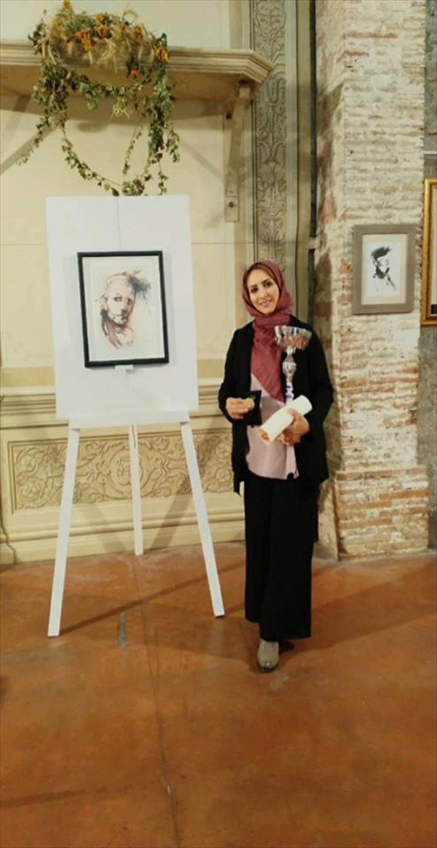 فنانة ليبية تحصد الجائزة الأولى من معرض دولي في بلجيكا