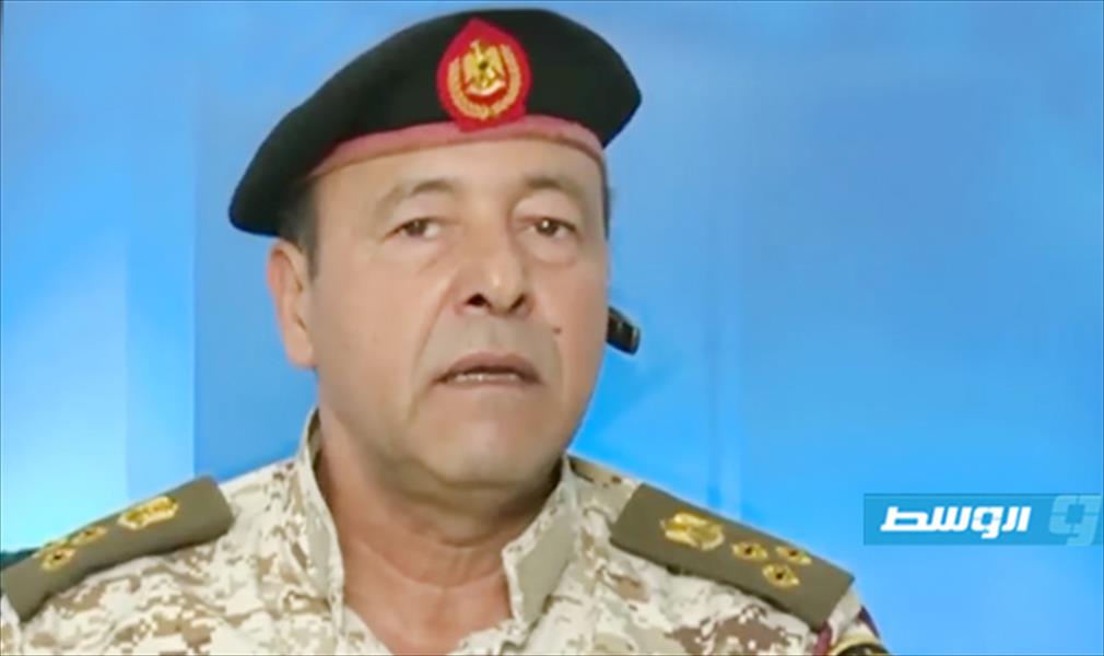 السراج ينهي الخدمة العسكرية للعميد محمد قنيدي