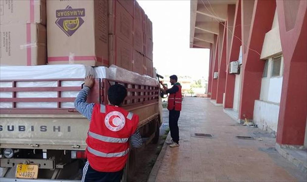 «الهلال الأحمر» في شحات تتسلم الدفعة الأولى من المساعدات الأساسية للنازحين‎