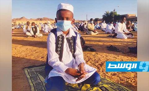 بالصور: الليبيون يؤدون صلاة العيد وسط إجراءات احترازية