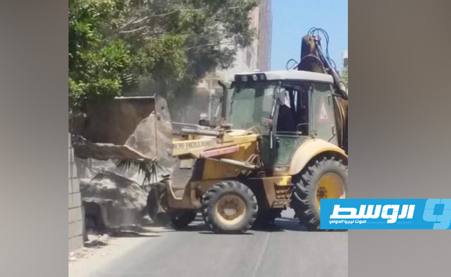 إزالة مبان عشوائية بمنطقة وسط البلاد في بنغازي, (وال)