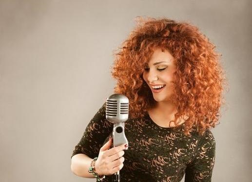 لينا شاماميان سعيدة بنجاح أغنية «هنعيش ونشوف»