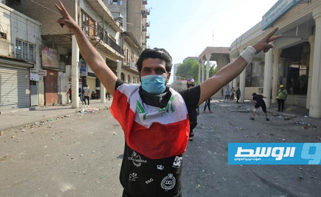 مقتل متظاهر في مواجهات بين الشرطة ومتظاهرين بمدن عراقية