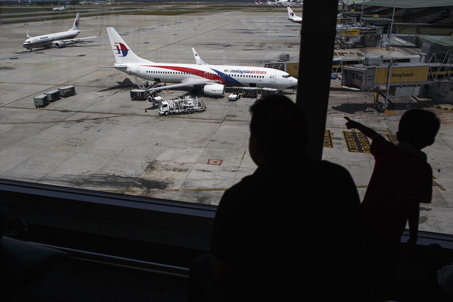 أوكرانيا: موالون لروسيا سرقوا جثثًا من الطائرة الماليزية