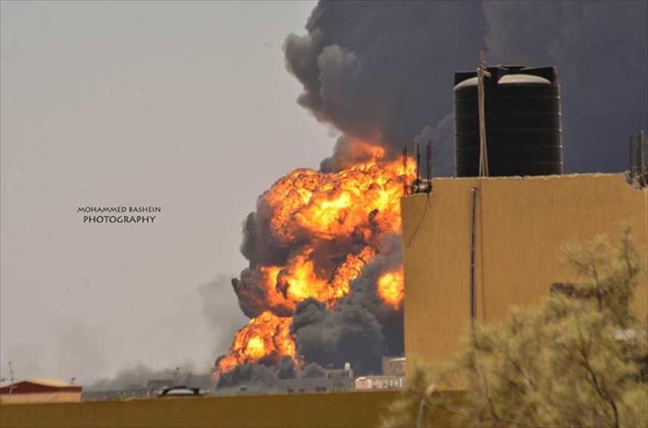 اشتعال النيران بمستودعات الوقود في طرابلس بعد تجدد القصف