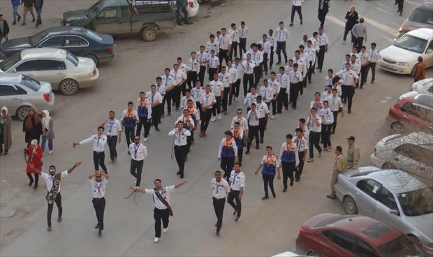 فرقة البحرية بكشاف بنغازي خلال مسيرة الاحتفال.(المفوضية)