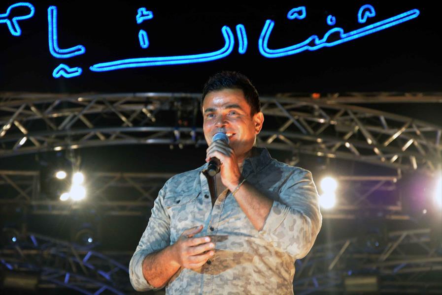 بالصور: عمرو دياب يُشعل بورتو أكتوبر بأغاني «شفت الأيام»