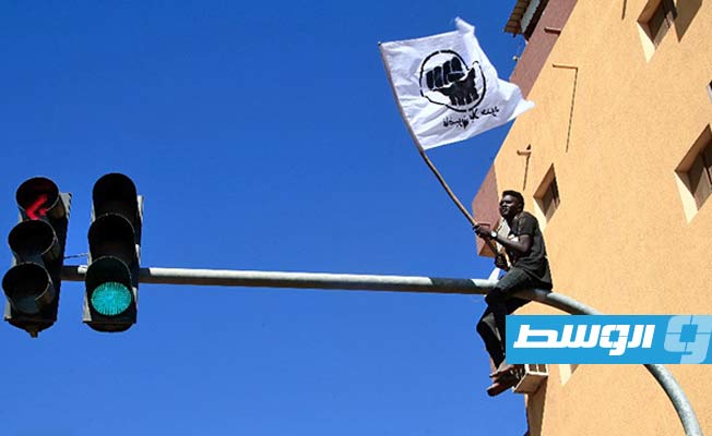 سوداني خلال تظاهره ضد الحكم العسكري في الخرطوم، 30 ديسمبر 2021. (فرانس برس)