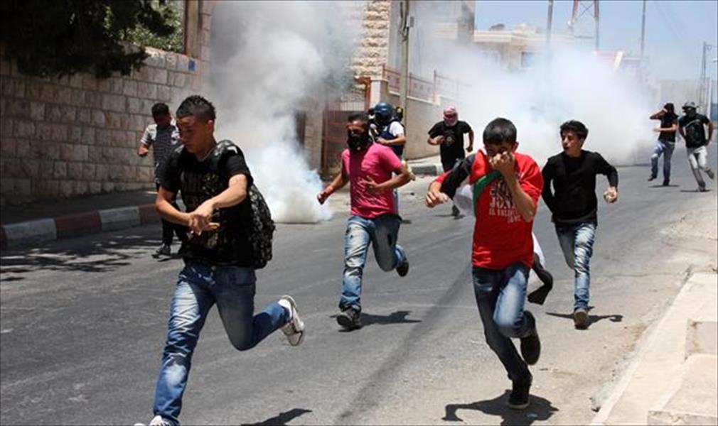 فلسطينيون يشتبكون مع قوات إسرائيلية بعد مقتل صبي
