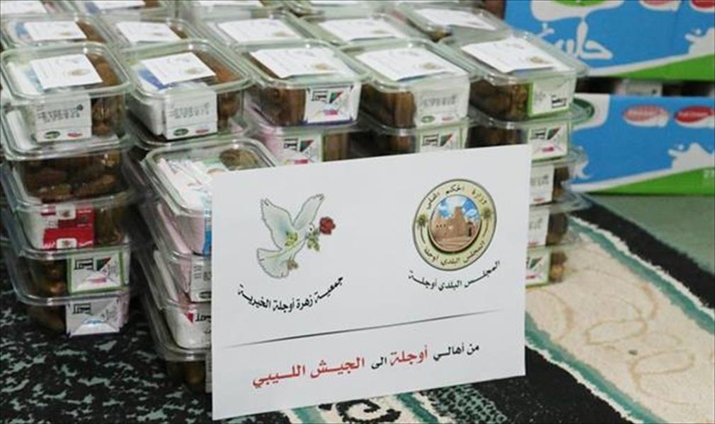 أهالي أوجلة يرسلون التمور للجيش الليبي