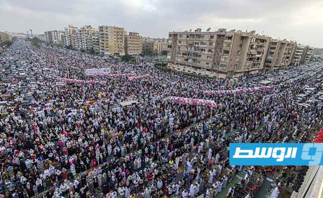 المسلمون يؤدون صلاة عيد الأضحى في العاصمة المصرية القاهرة، 9 يوليو 2022. (أ ف ب)