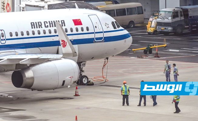حملة فحوص واسعة بمطار «شنغهاي» بعد تسجيل إصابات جديدة بـ«كورونا»