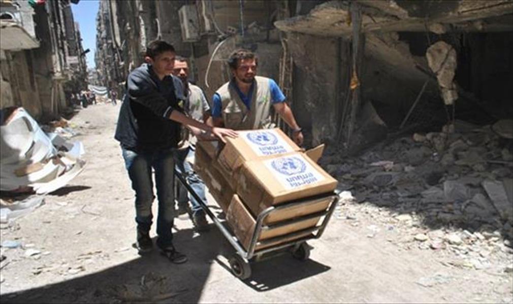 بالصور.. آلاف المساعدات الإنسانية تصل إلى مخيم اليرموك