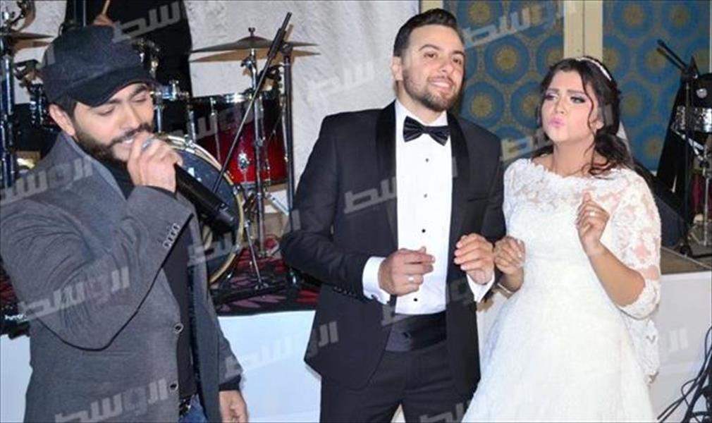 بالصور: تامر حسني وحماقي ونجوم الغناء في زفاف مدين