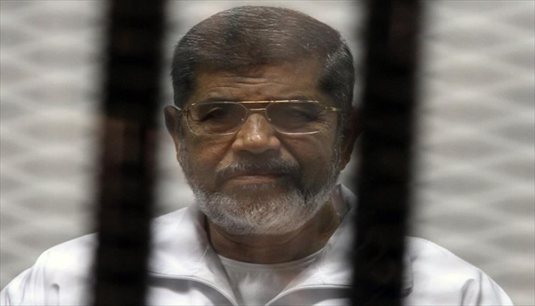 نجل محمد مرسي ينفي وفاة والده