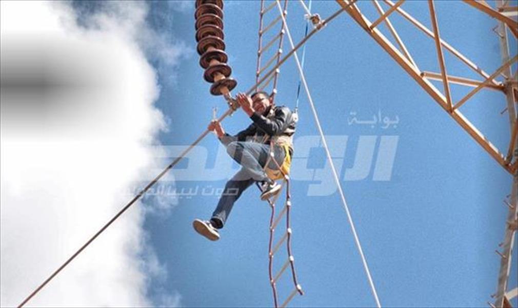بالصور: صيانة خط كهرباء جنوب بنغازي - إجدابيا والقوارشة - قمينس