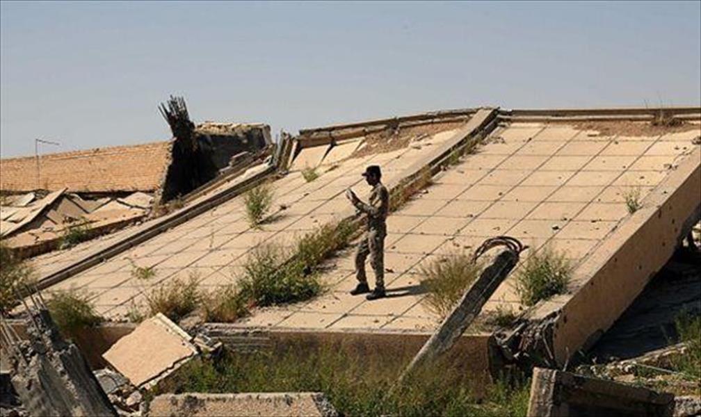 بالصور: تدمير قبر صدام حسين جراء القتال قرب تكريت