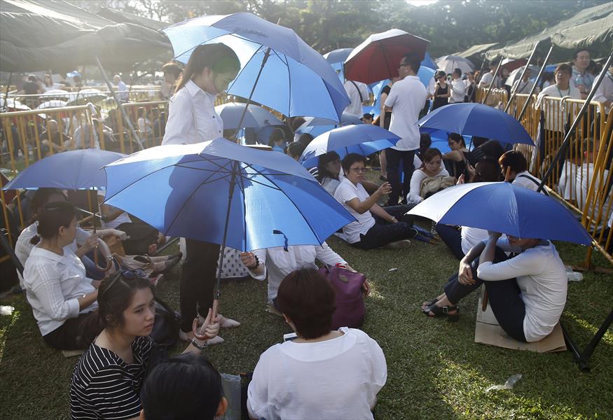 بالصور: توافد الحشود لإلقاء النظرة الأخيرة على مؤسس سنغافورة الحديثة