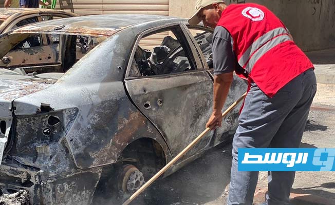 متطوعو «الهلال الأحمر» يشاركون في تنظيف مناطق الاشتباكات في طرابلس