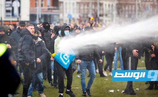 مواجهات مع الشرطة وأعمال نهب خلال تظاهرات ضد حظر التجول في هولندا