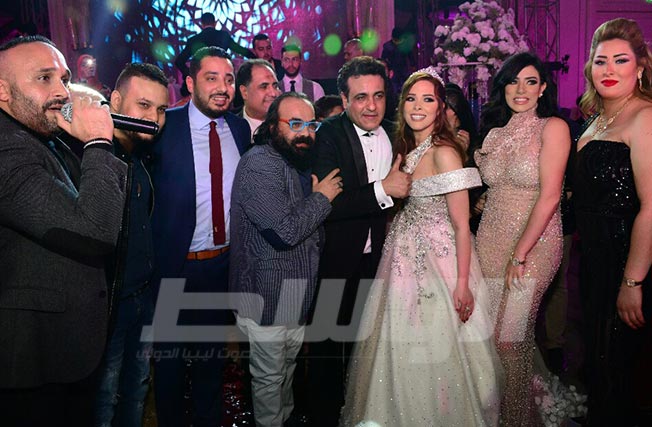 بالصور: نجوم الفن في حفل زفاف محمد رحيم ومدربة الأسود