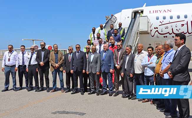 مراسم استقبال طائرة الخطوط الليبية نوع إيرباص (A320) بمطار معيتيقة بعد صيانتها في تونس، الأحد 19 يونيو 2022. (وزارة المواصلات)