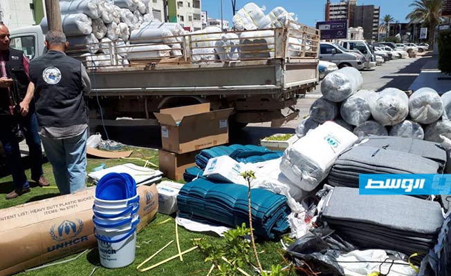 جانب من توزيع المساعدات على النازحين (مفوضية شؤون اللاجئين في ليبيا)