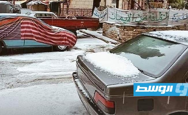 بالصور: الثلوج تكسو شوارع الإسكندرية وطقس بارد على القاهرة وشمال الصعيد