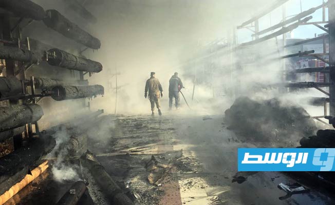 بالصور.. إخماد حريق في سوق أبوسليم بالعاصمة طرابلس