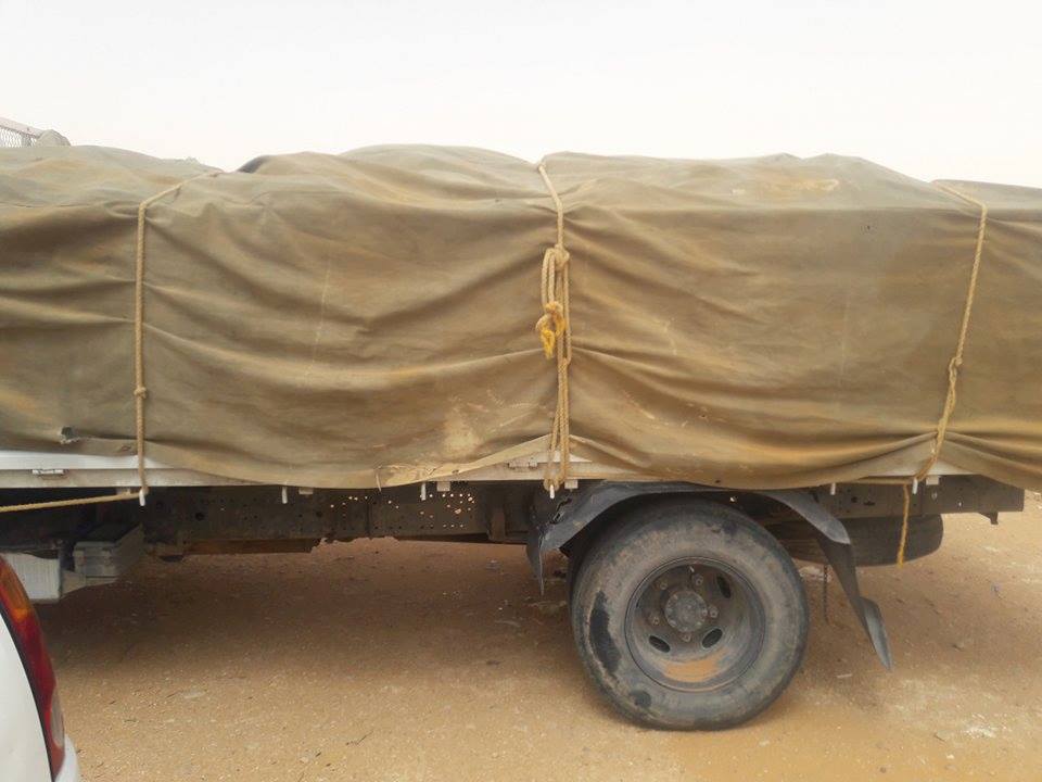 توزيع مساعدات على 250 عائلة من نازحي تاورغاء بمخيم قرارة القطف