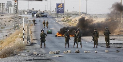 مقتل فلسطينيين اثنين وضابط إسرائيلي في مواجهات بالضفة الغربية